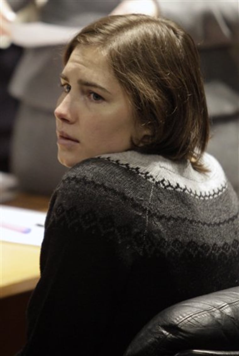 Amanda Knox sits at the beginning of a hearing in her appeals trial at Perugia's courthouse on Saturday, Dec. 11, 2010.